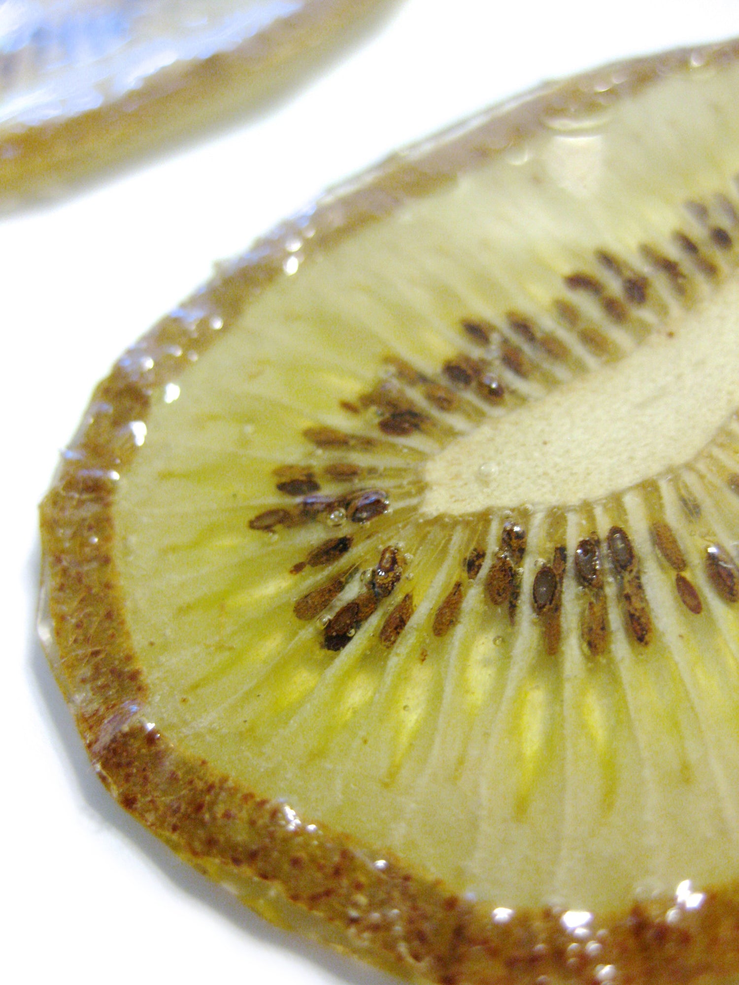 real kiwi earring close up