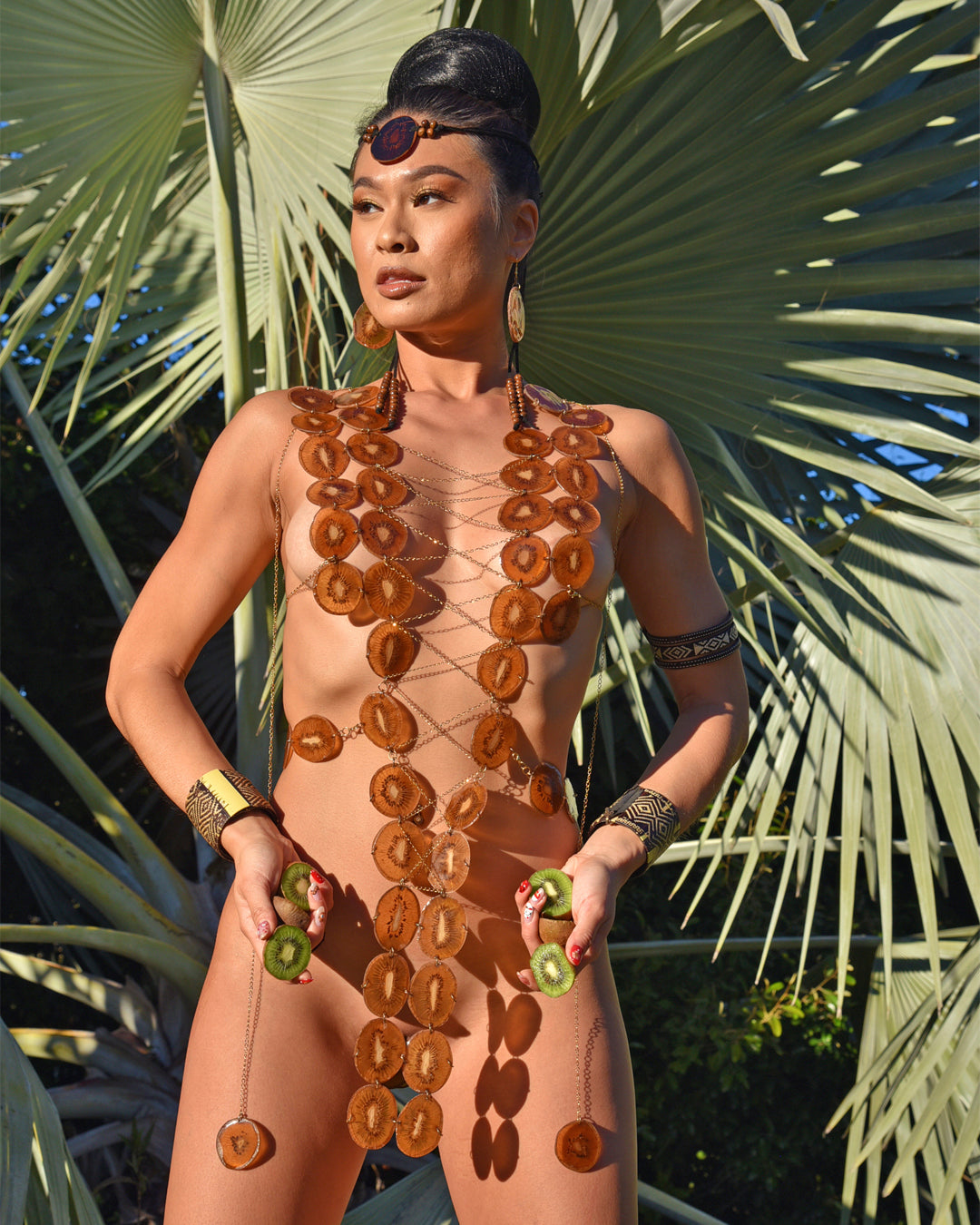 Real kiwi body jewelry on model designed by Liliana Salazar